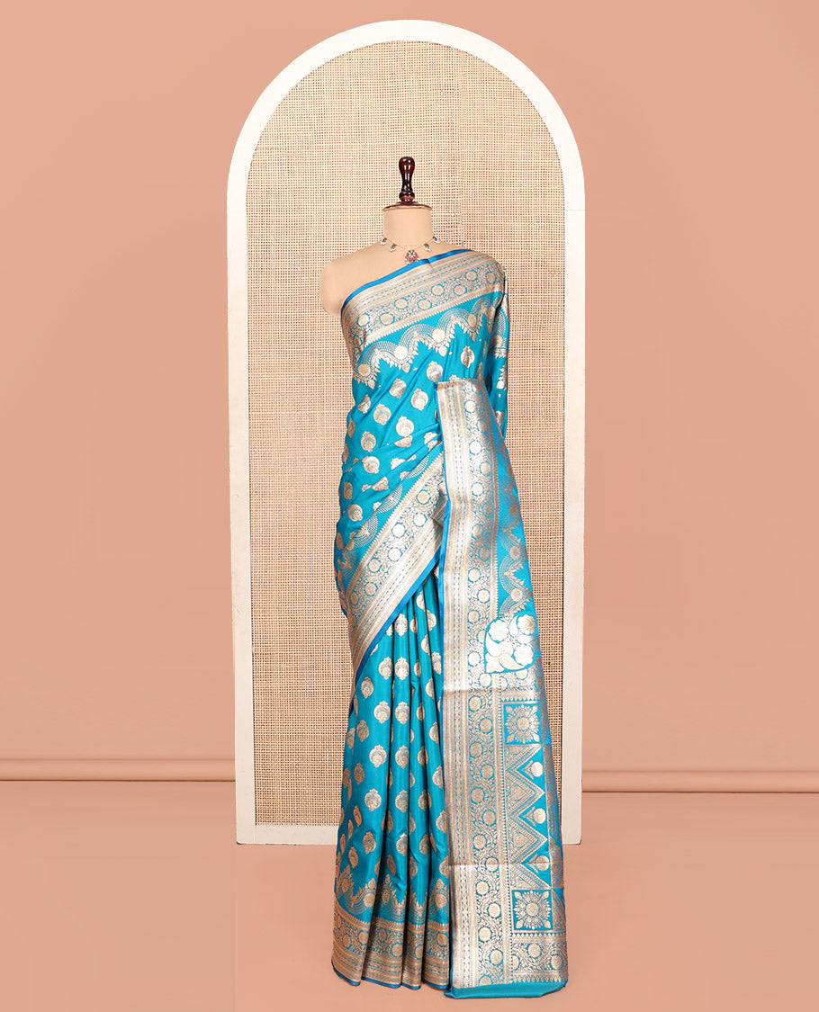 Blue Banarasi Nylon Saree, Impeccably Styled with Zari Buttas, Highlighted by a Traditional Zari Border, Intricate Pallu, and a Matching Blouse