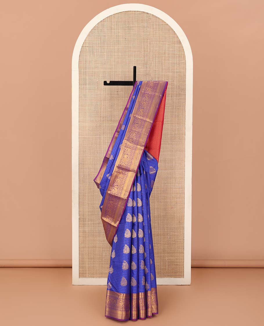Ultramarine blue checked and zari buttas silk saree, contrast border of mayil kann, banaras, vanki, neli, and mayil, and jaal pallu