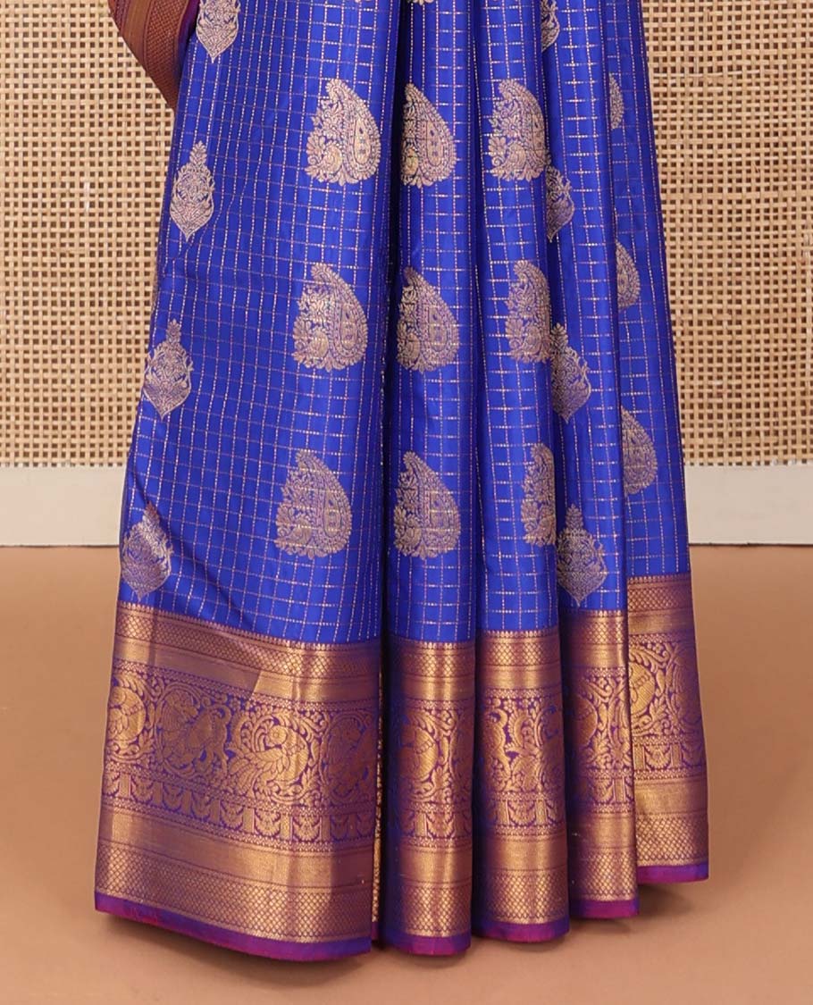 Ultramarine blue checked and zari buttas silk saree, contrast border of mayil kann, banaras, vanki, neli, and mayil, and jaal pallu