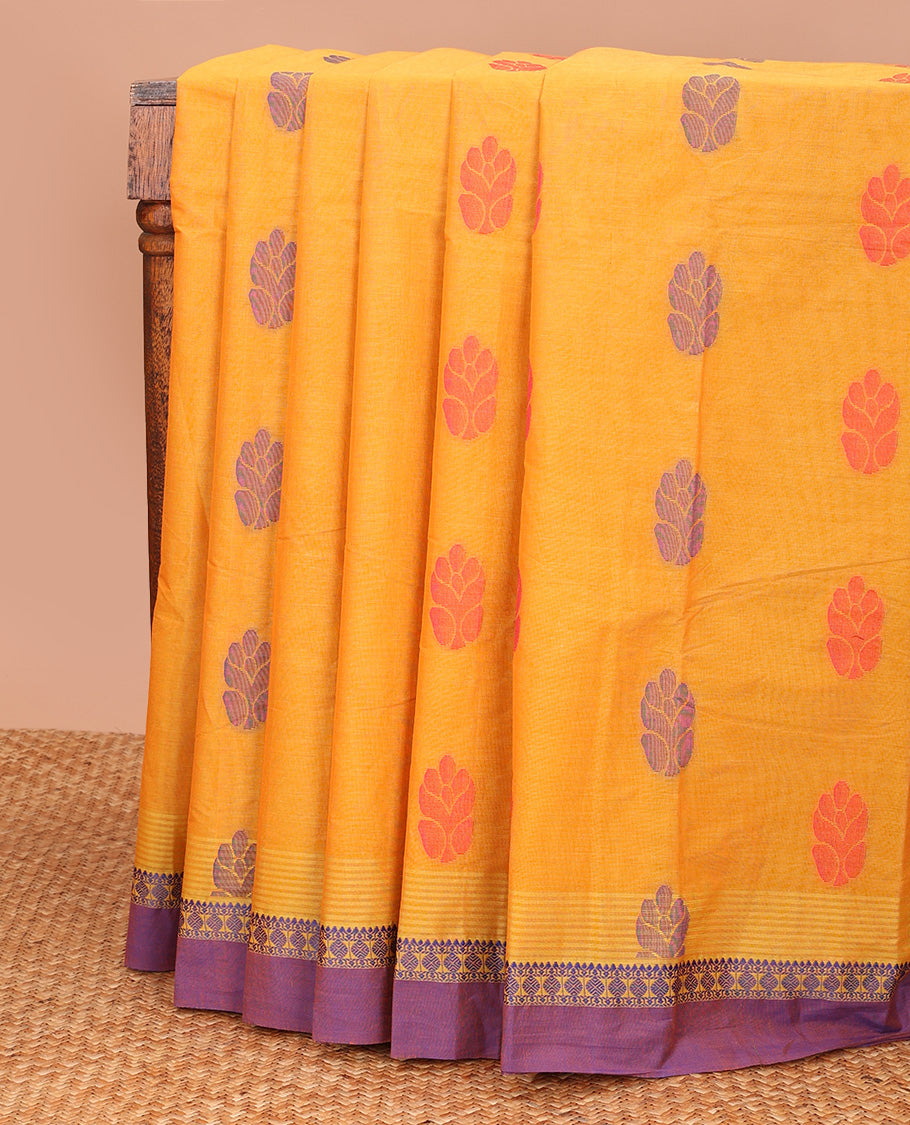 Mustard buttas kanchi cotton saree, contrast traditional motifs border, and pallu of paisley designs