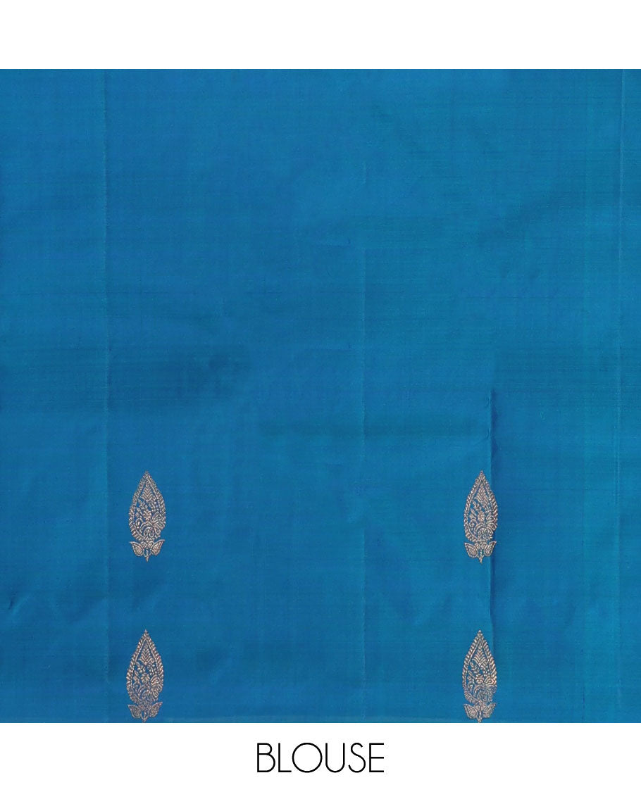 Blue zari design Kanchipuram silk saree, zari border, and pallu of thazampoo rekku, mayil chakram, and jaal design