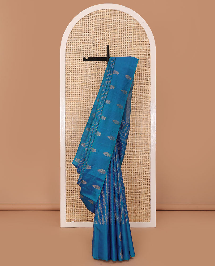 Blue zari design Kanchipuram silk saree, zari border, and pallu of thazampoo rekku, mayil chakram, and jaal design