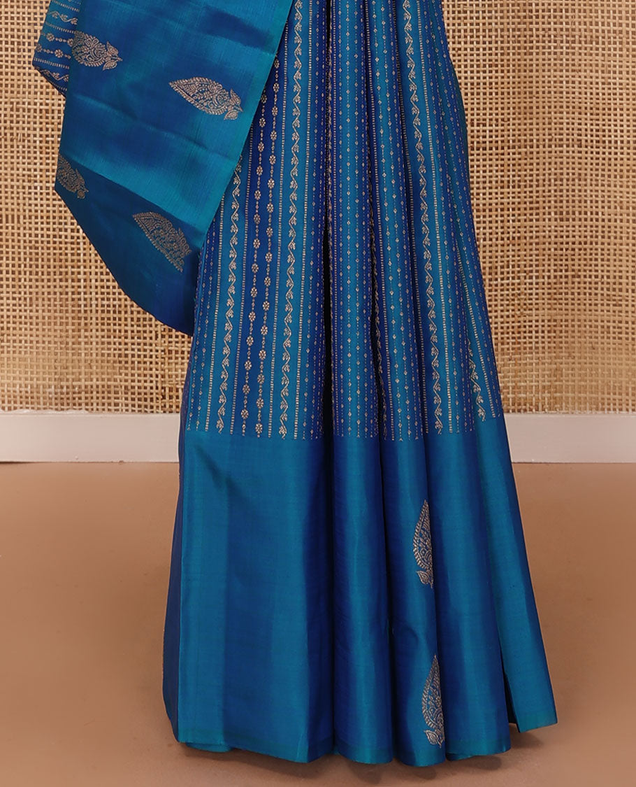 Blue zari design Kanchipuram silk saree, zari border, and pallu of thazampoo rekku, mayil chakram, and jaal design