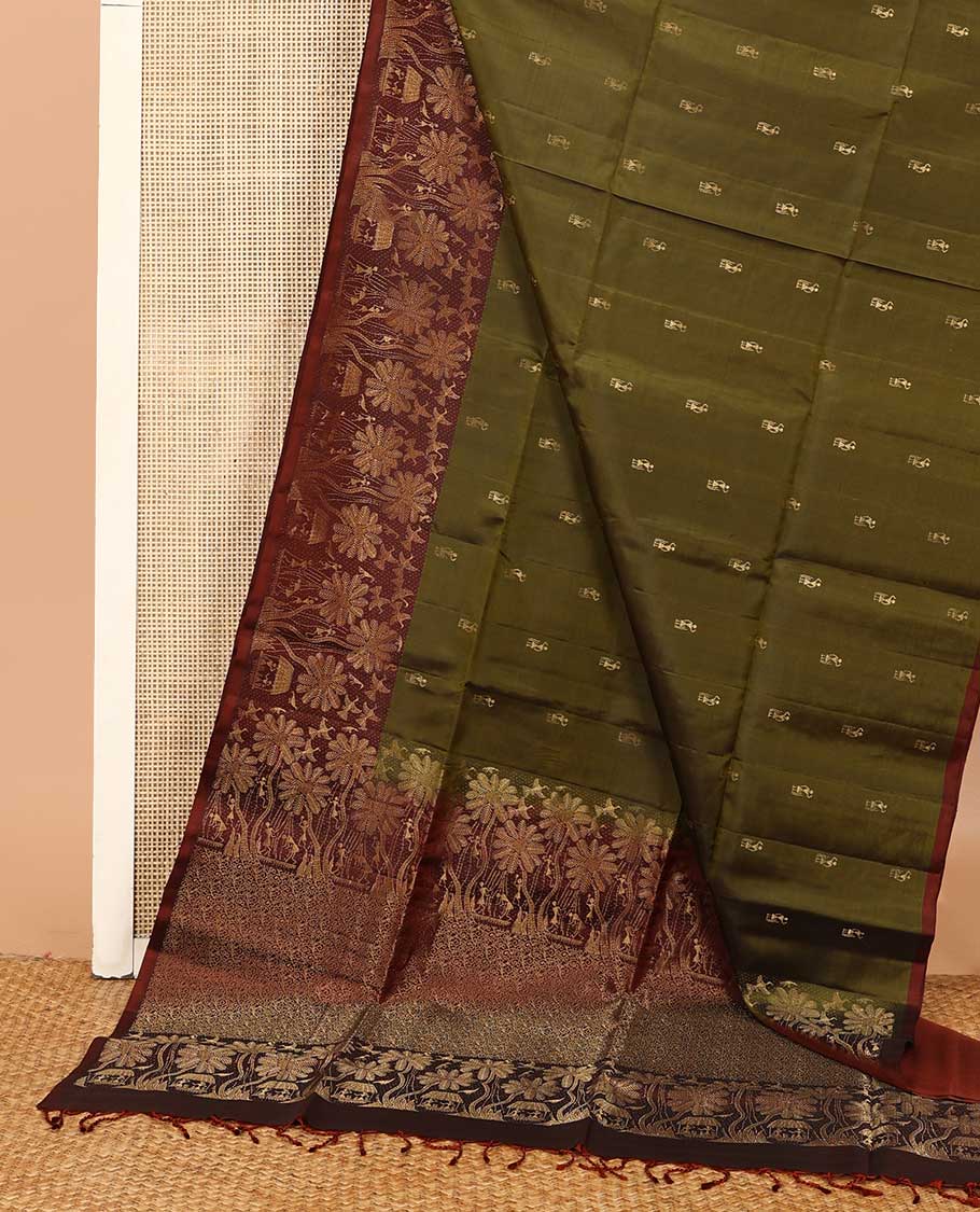 Green warli motifs woven soft silk saree, contrast warli-village theme woven border, and pallu of floral and warli-village theme designs