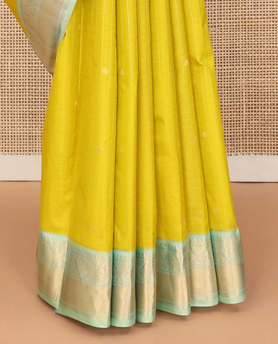 Mustard zari design silk saree, contrast border of thilakam, kathir, and mayil designs, and then kuli kann style oven pallu
