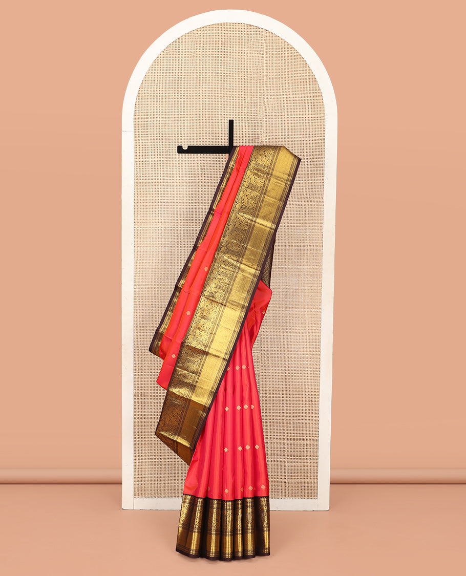 Coral Vasundhara Silk Saree, Elevated with Zari Buttas All Over Its Body, Complemented by a Contrast Border of Manga, Muthu, Kathir, Mayil, and Yaanai Designs, Grand Jaal Pallu, and Paired with a Contrast Blouse