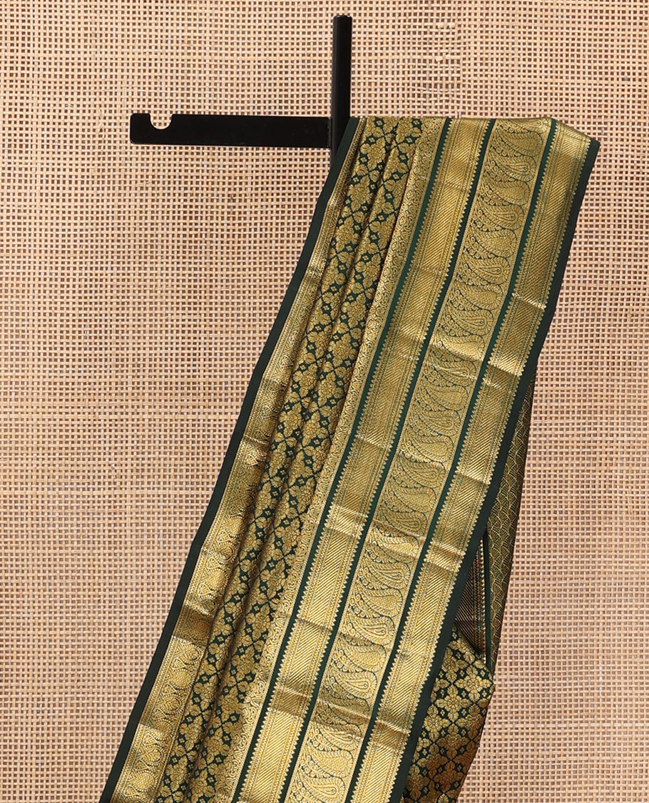 Green jacquard wedding silk saree, zari border of rekku, muthu, and manga designs, and intricate pallu