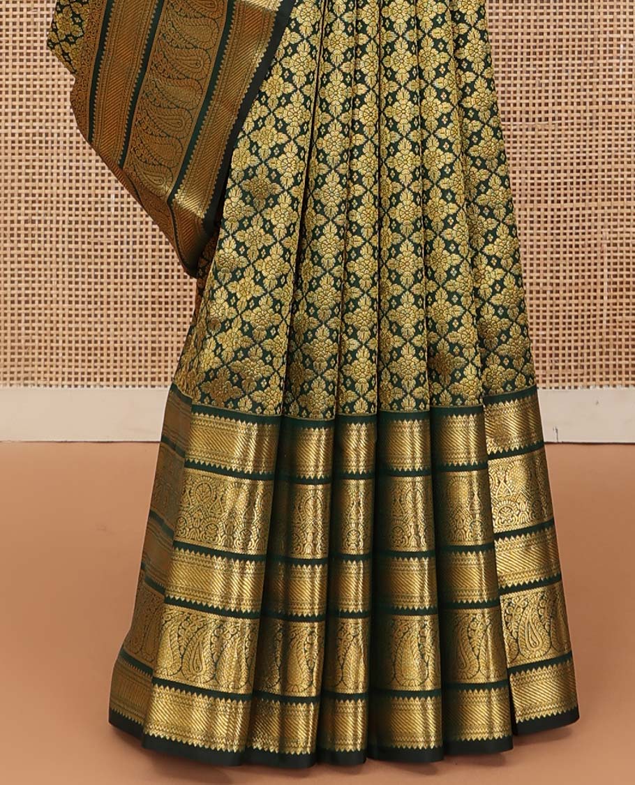 Green jacquard wedding silk saree, zari border of rekku, muthu, and manga designs, and intricate pallu