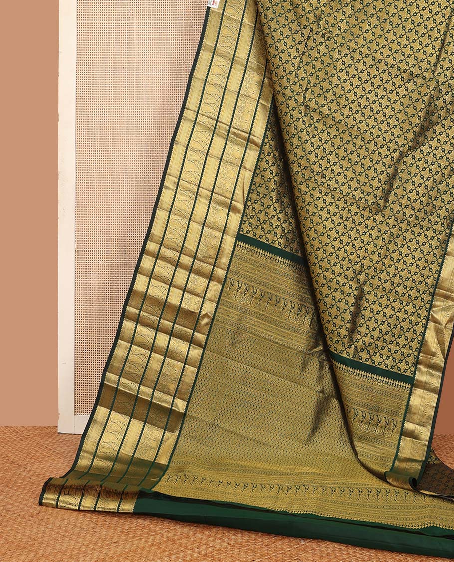 Green jacquard wedding silk saree, zari border of rekku, muthu, and manga designs, and intricate pallu