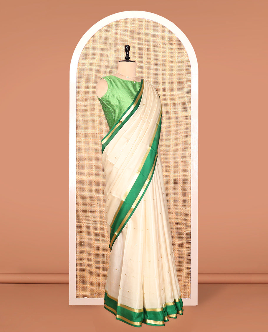 Cream Mysore Silk Saree, Embellished with Buttas, Complemented by a Contrast Traditional Zari Border, Zari Design Pallu, and a Contrast Blouse