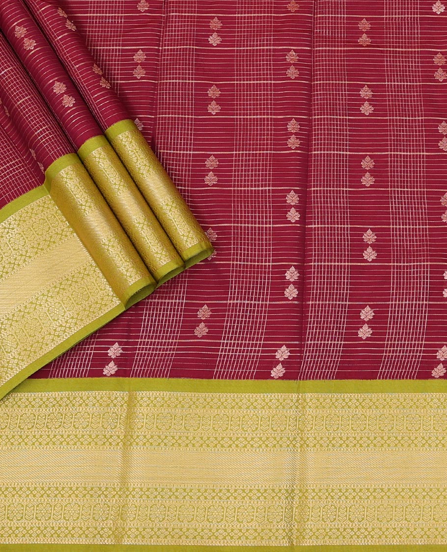 Burgundy Art Silk Pavadai Material Set, Featuring Zari Buttas Enclosed Checks All Over the Skirt, Complemented by a Contrast Traditional Zari Design Border, and Paired with a Contrast Blouse