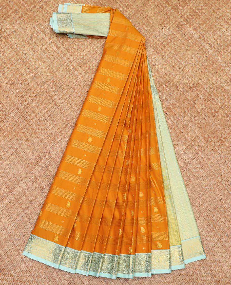 Orange Budget Silk Saree Bedecked with Zari Stripes and Paisley Buttas, Complemented by a Contrast Border of Traditional Zari Designs, Subtly Designed Pallu of Stripes, and Paired with a Contrast Blouse