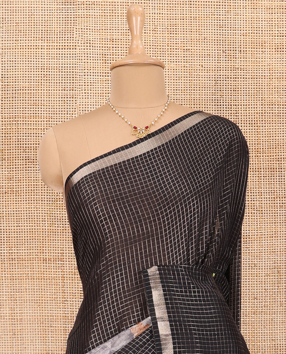 Black Assam Silk Saree Graced with Micro-Checks and Floral Prints, Featuring a Simple Piping Border, Subtly Woven Pallu with Zari Stripes, Paired with a Matching Checked Blouse