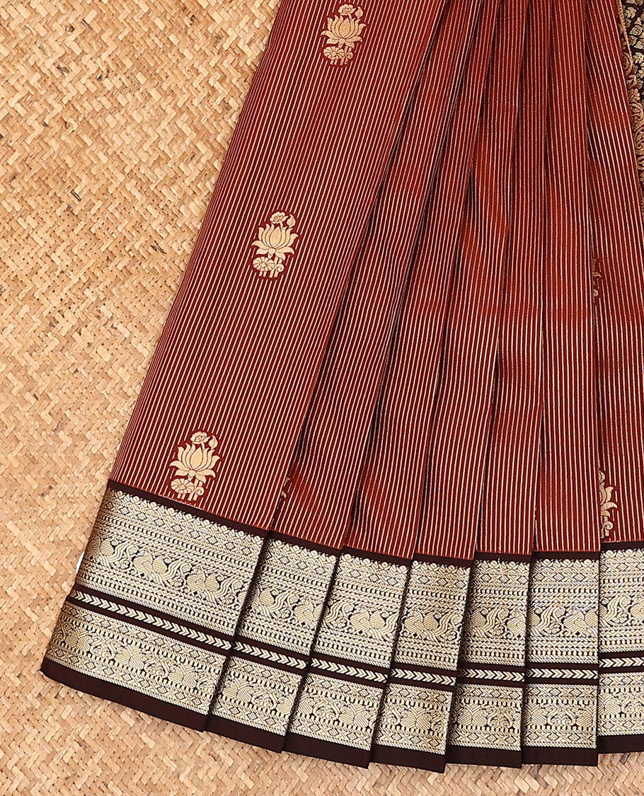 Maroon zari buttas, and striped gift saree, contrast traditional zari design rettai pettu border, and zari-rich jaal pallu