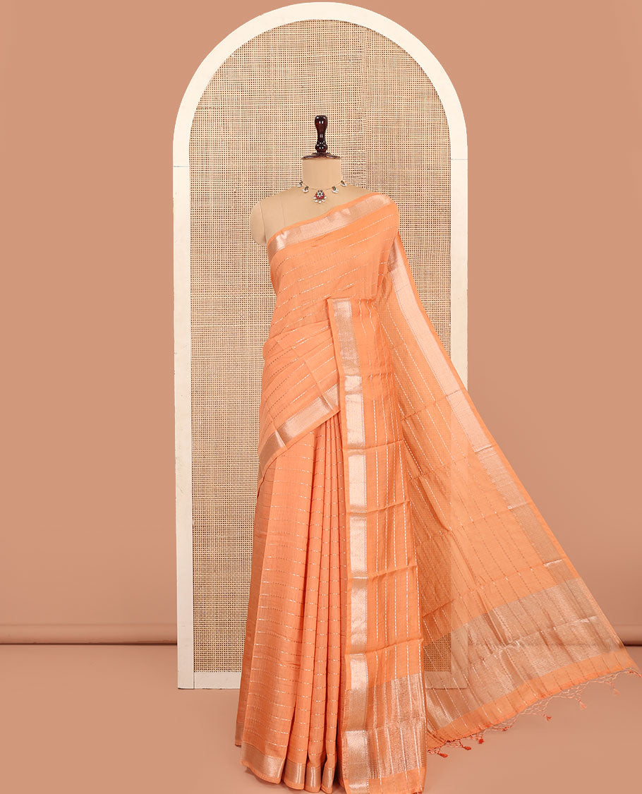 Orange Assam Silk Saree, Gleamed Up with Zari Stripes on Its Body, Highlighted by Zari Border, Pallu Steeped with Zari Stripes, and Paired with a Contrast Blouse