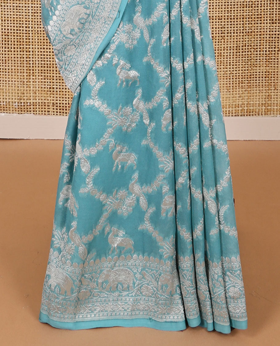 Blue floral jaal, animal design banaras silk saree with self zari design & forest theme pallu