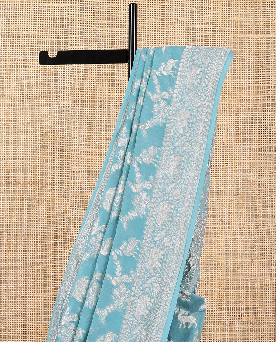 Blue floral jaal, animal design banaras silk saree with self zari design & forest theme pallu