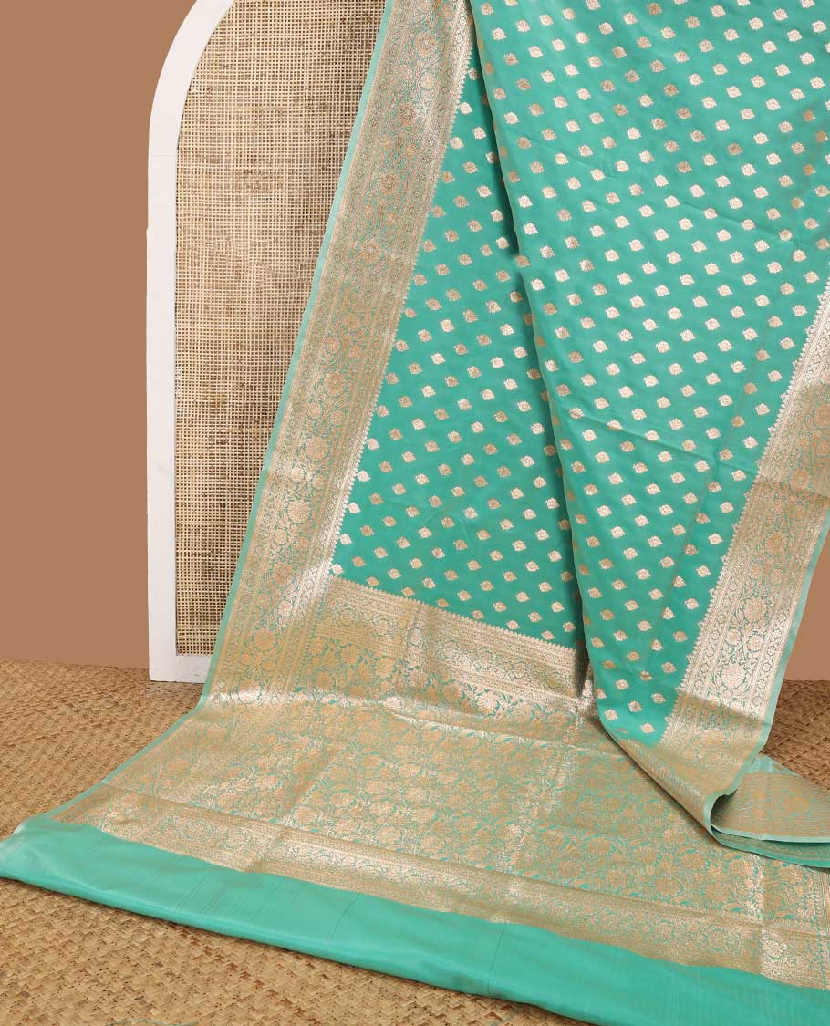 Sea green leaf buttas semi banaras nylon saree with self traditional zari design border & floral vine design pallu
