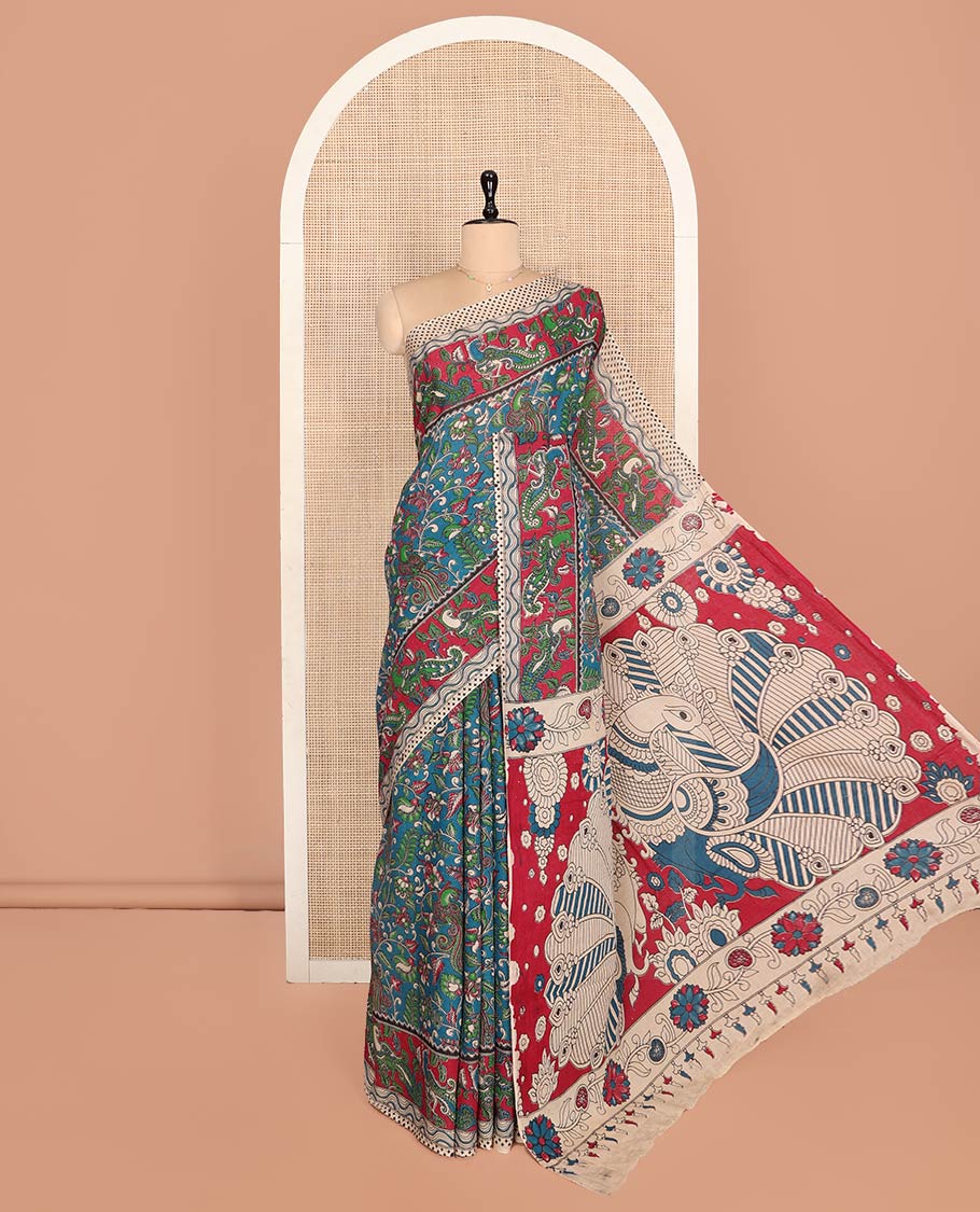 Blue Machine-Printed Kalamkari Cotton Saree Features Floral and Peacock, a Contrast Peacock Border, Kalamkari Printed Pallu, and a Contrast Blouse