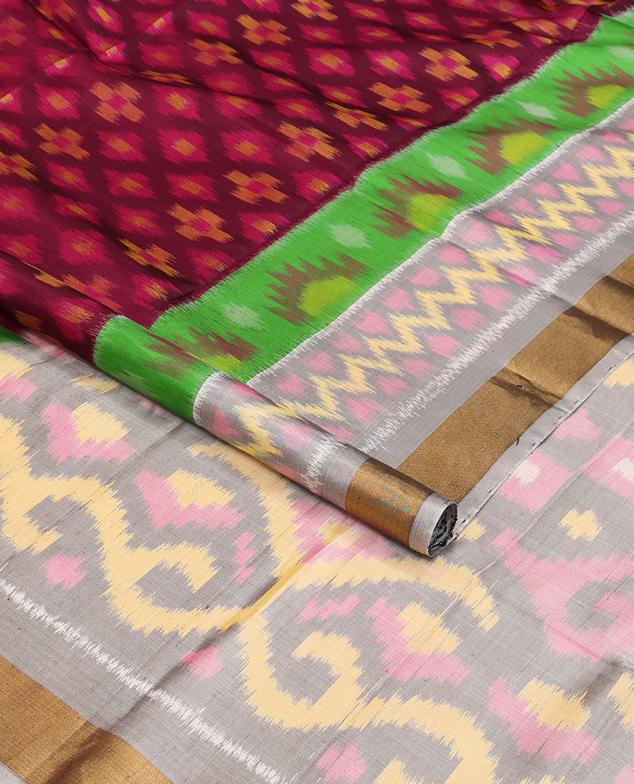 Maroon buttas pure ikkat saree, contrast multi-color geometric patterned ikkat border & pallu