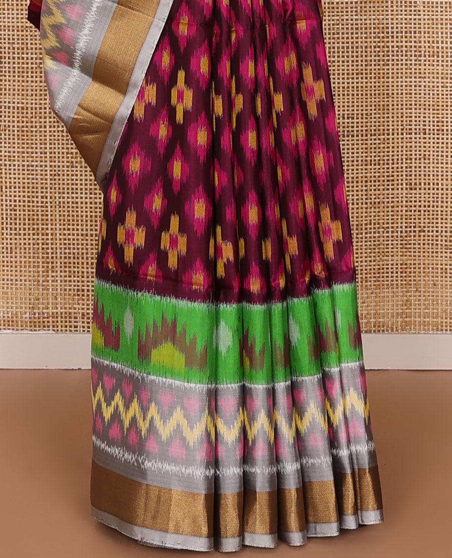 Maroon buttas pure ikkat saree, contrast multi-color geometric patterned ikkat border & pallu