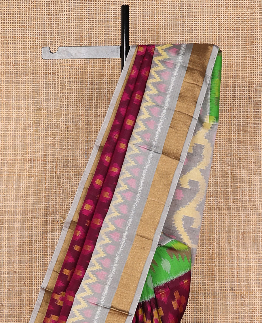 Maroon buttas pure ikkat saree, contrast multi-color geometric patterned ikkat border & pallu
