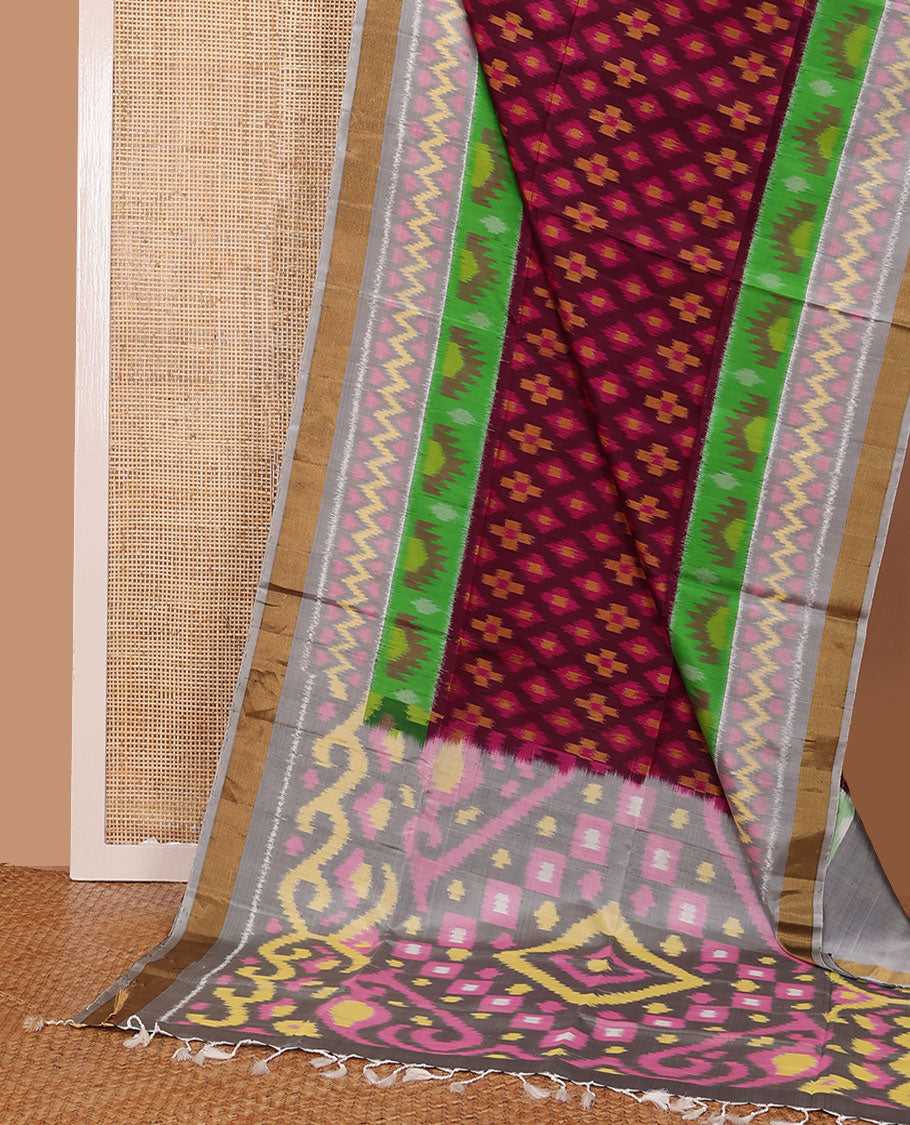 Maroon buttas pure ikkat saree, contrast multi-color geometric patterned ikkat border & pallu