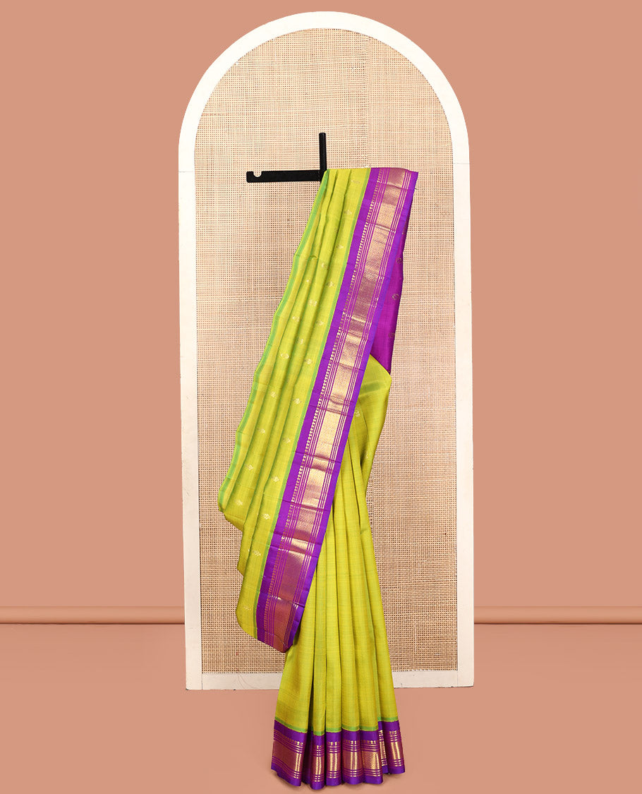 Green Kanchipuram Silk Saree, Detailed with Zari Buttas, Contrast Border of Paneer Sombu, Banaras, Muthu,and Mayil Kann, Zari Design Pallu, and No Blouse