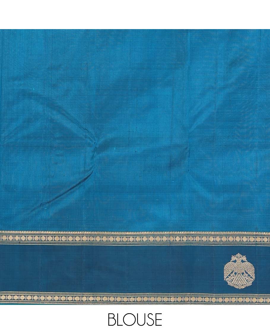 Blue plain Kanchipuram silk saree, contrast border of rekku, muthu, rudraksham and iruthalai pakshi motifs, and zari striped pallu