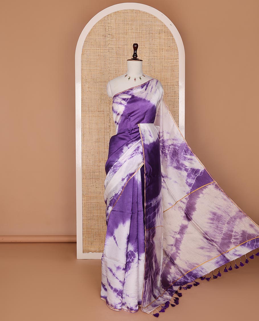Borderless violet and white Shibori-style tie-dye printed saree, shibori printed pallu with violet tassels