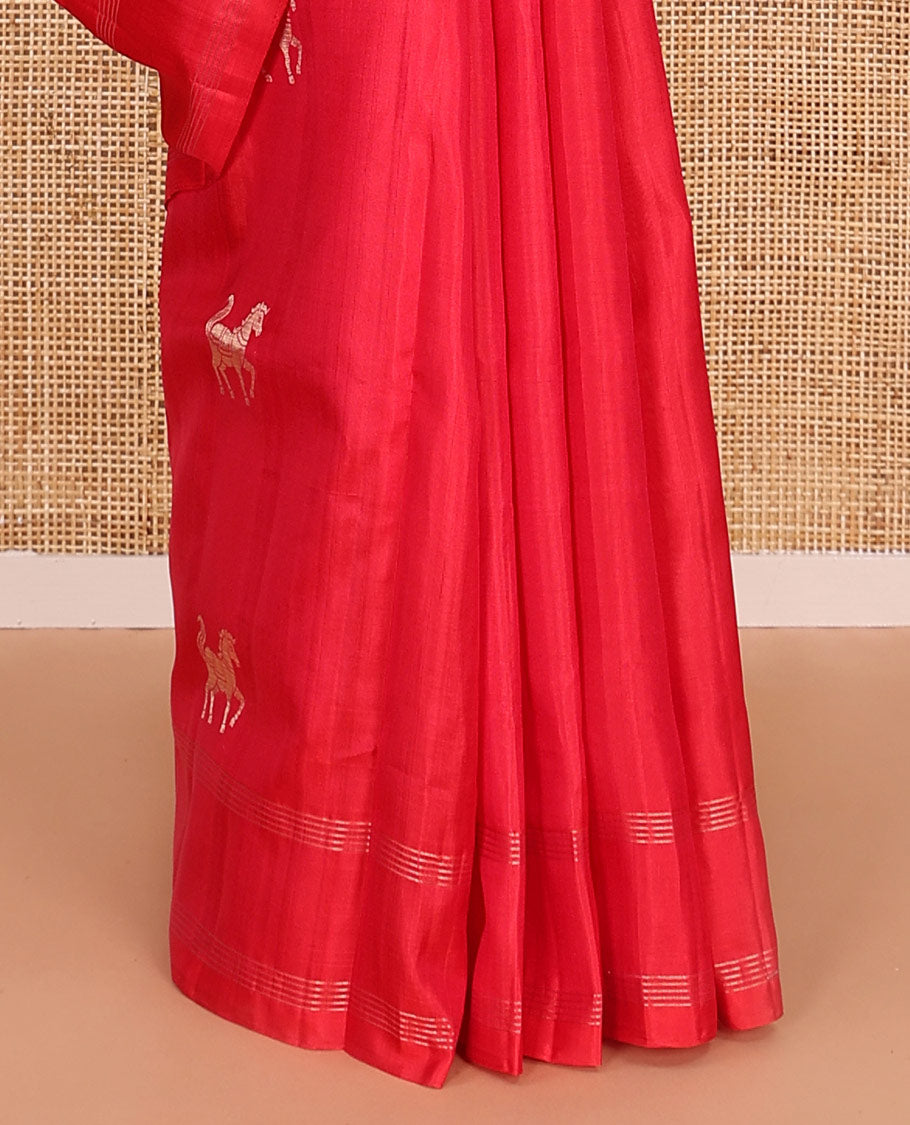 Red kuthirai buttas soft silk saree, zari border, and pallu of floral, house, and elephant motifs
