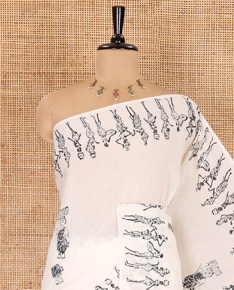 Cream warli-style human motifs block printed mul cotton saree, warli block printed border, warli block printed pallu, and a matching blouse