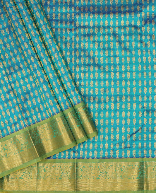 Blue zari buttas pure-silk half saree, contrast border & blouse of floral,manga & mayil kann & zari design dhavani