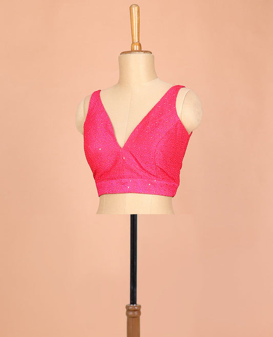 Pink embossed thread embroidery & sequins work sleeveless readymade blouse with deep-V front neck & round back neck