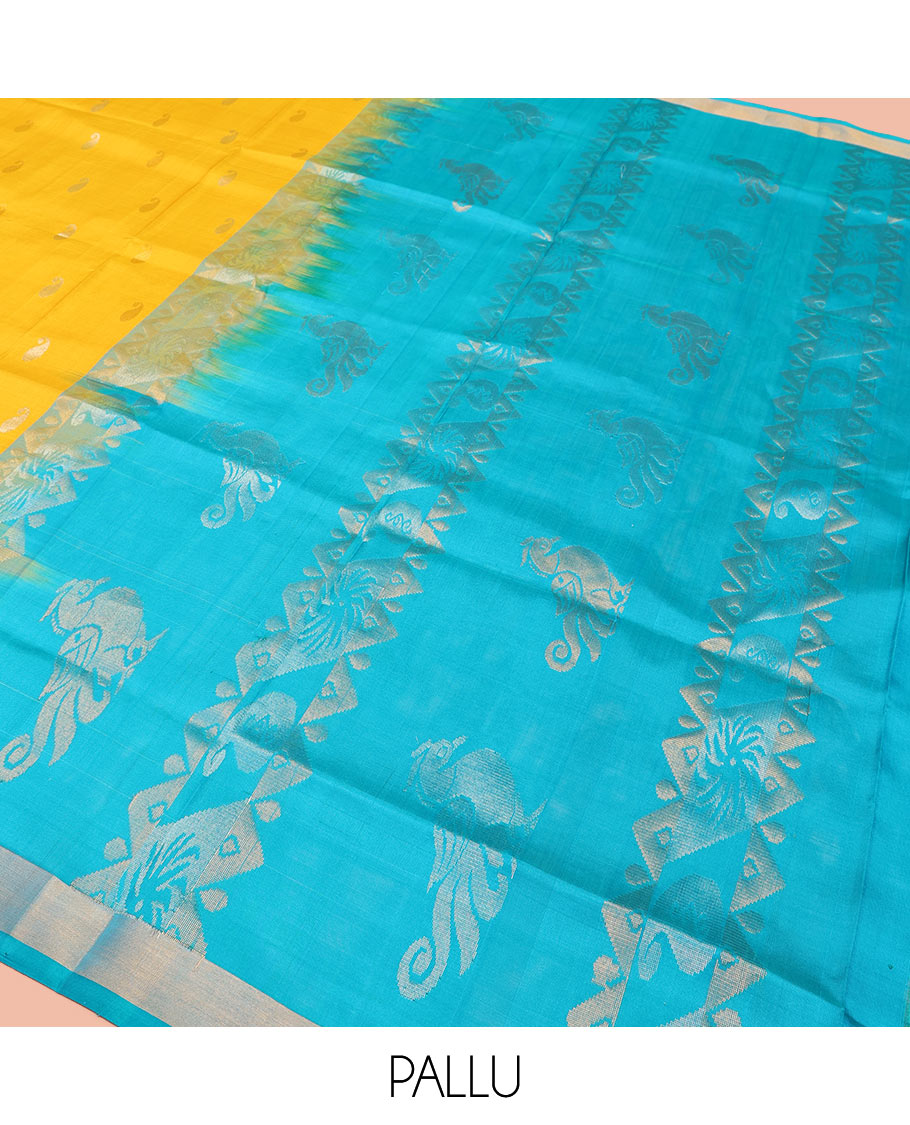 Yellow Uppada Silk Saree Gracefully Embellished with Zari Buttas and Paisley Buttas, Subtle Bavanji Border, Complemented by Contrast Pallu of Peacock Designs, and Paired with a Contrast Blouse