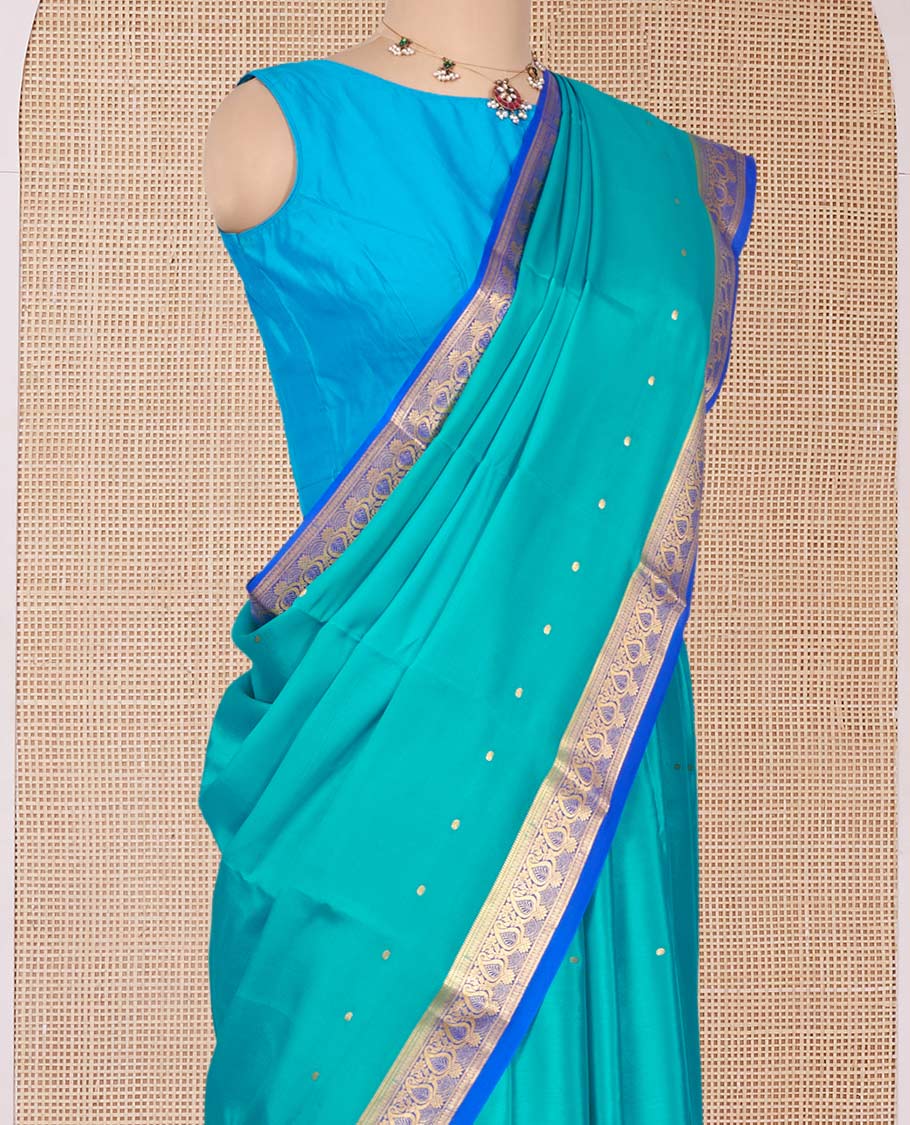 Green Mysore Silk Saree, Woven with Zari Buttas All Over Its Body, Complemented by a Contrast Traditional Zari Design Border, Zari-Buttas Woven Pallu, and Paired with a Contrast Blouse