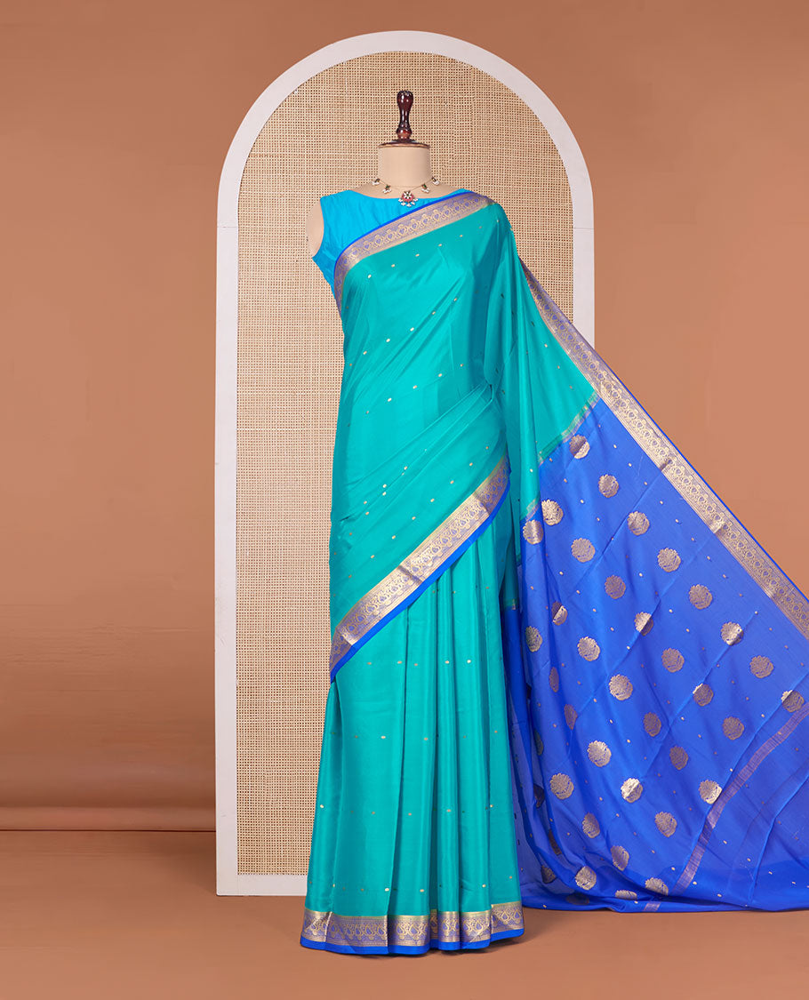 Green Mysore Silk Saree, Woven with Zari Buttas All Over Its Body, Complemented by a Contrast Traditional Zari Design Border, Zari-Buttas Woven Pallu, and Paired with a Contrast Blouse