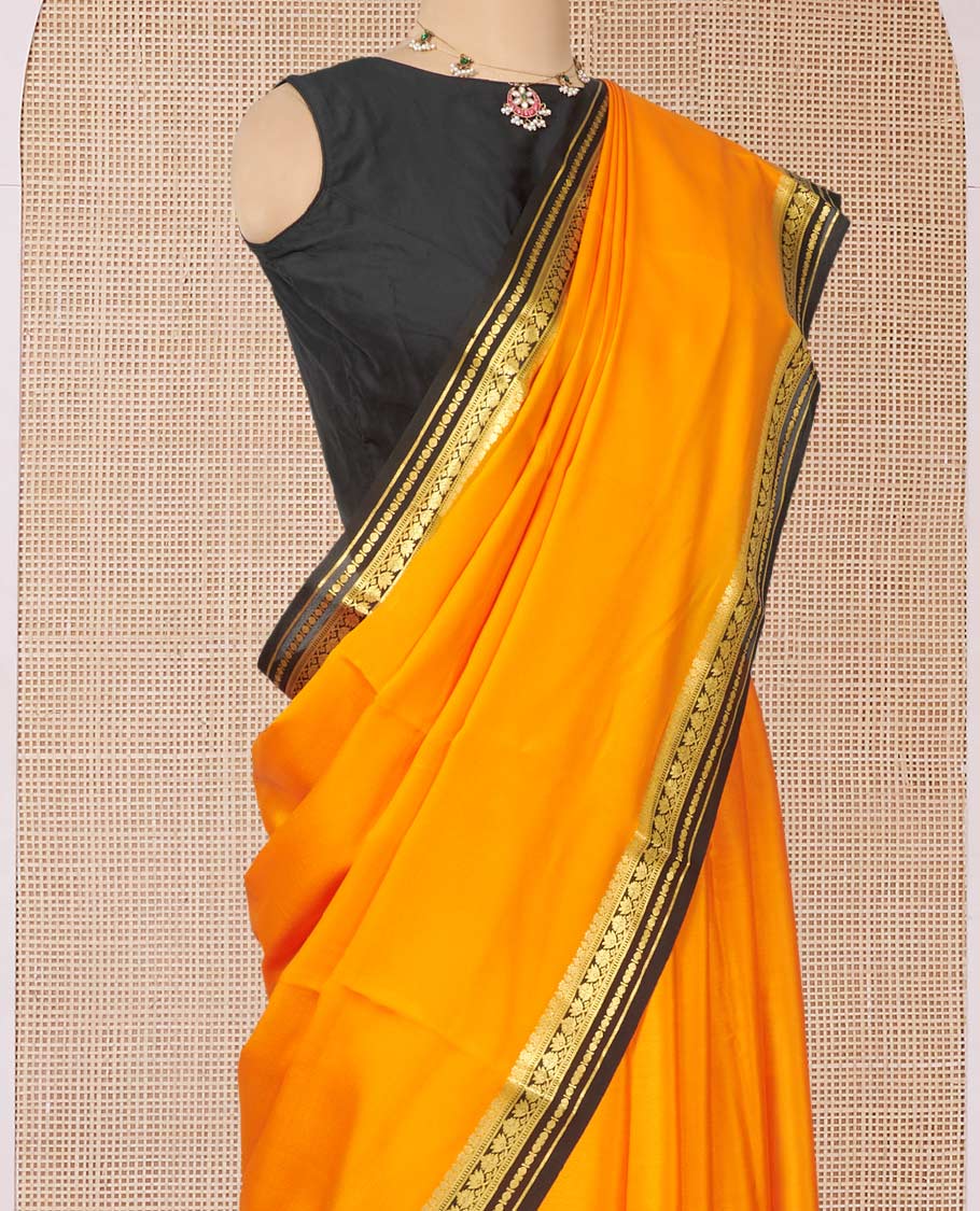 Orange Plain Mysore Silk Saree, Complemented by a Contrast Traditional Zari Design Border, Zari Striped Pallu, and Paired with a Contrast Blouse