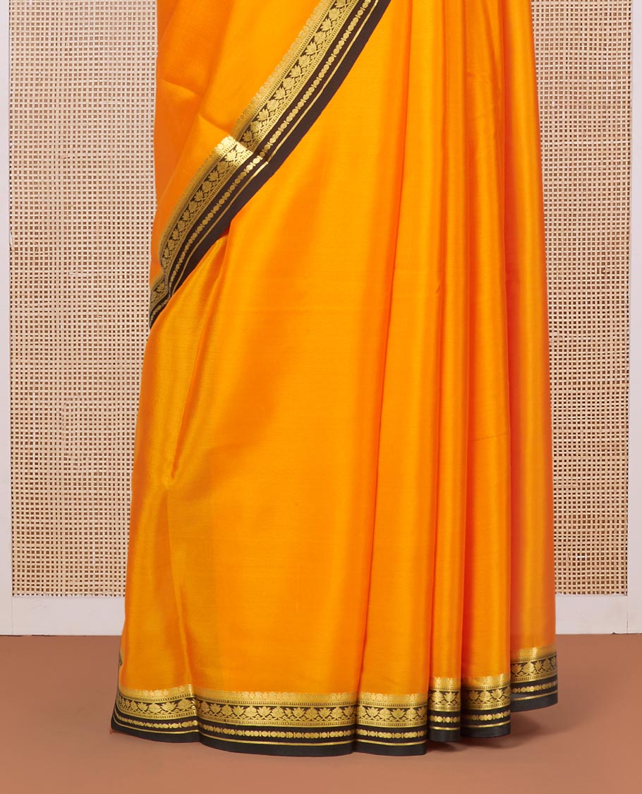 Orange Plain Mysore Silk Saree, Complemented by a Contrast Traditional Zari Design Border, Zari Striped Pallu, and Paired with a Contrast Blouse