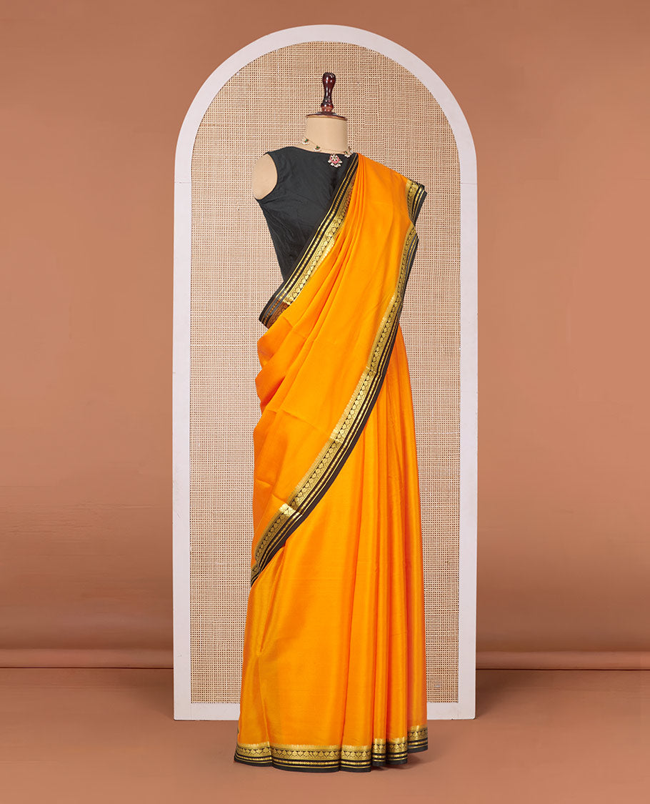 Orange Plain Mysore Silk Saree, Complemented by a Contrast Traditional Zari Design Border, Zari Striped Pallu, and Paired with a Contrast Blouse