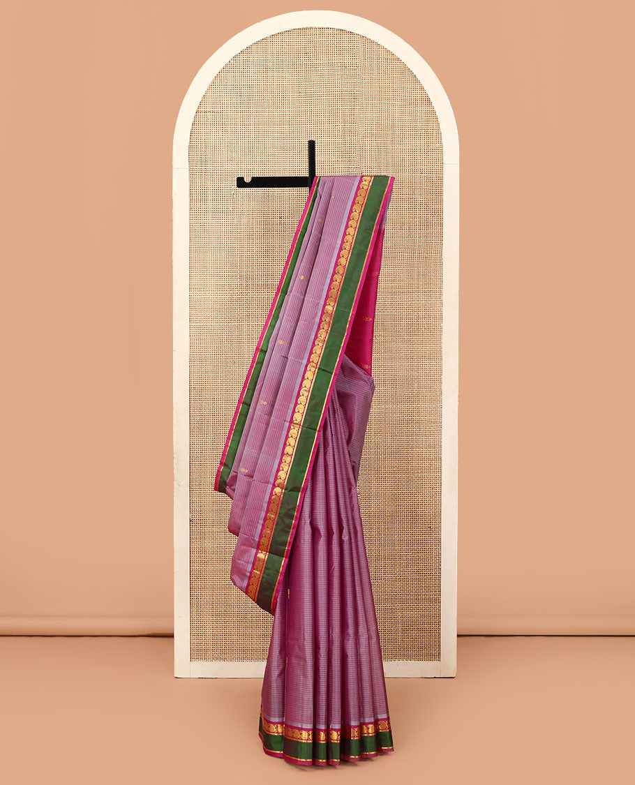 Purple striped and buttas Kanchipuram silk saree, contrast rettai pettu border of manga and kathir designs, and zari design pallu