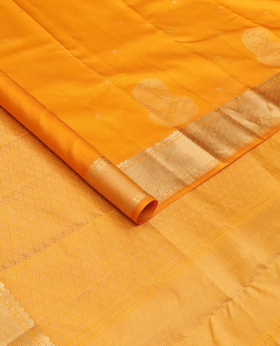Yellow zari buttas silk saree, traditional zari border and zari-rich jaal pallu