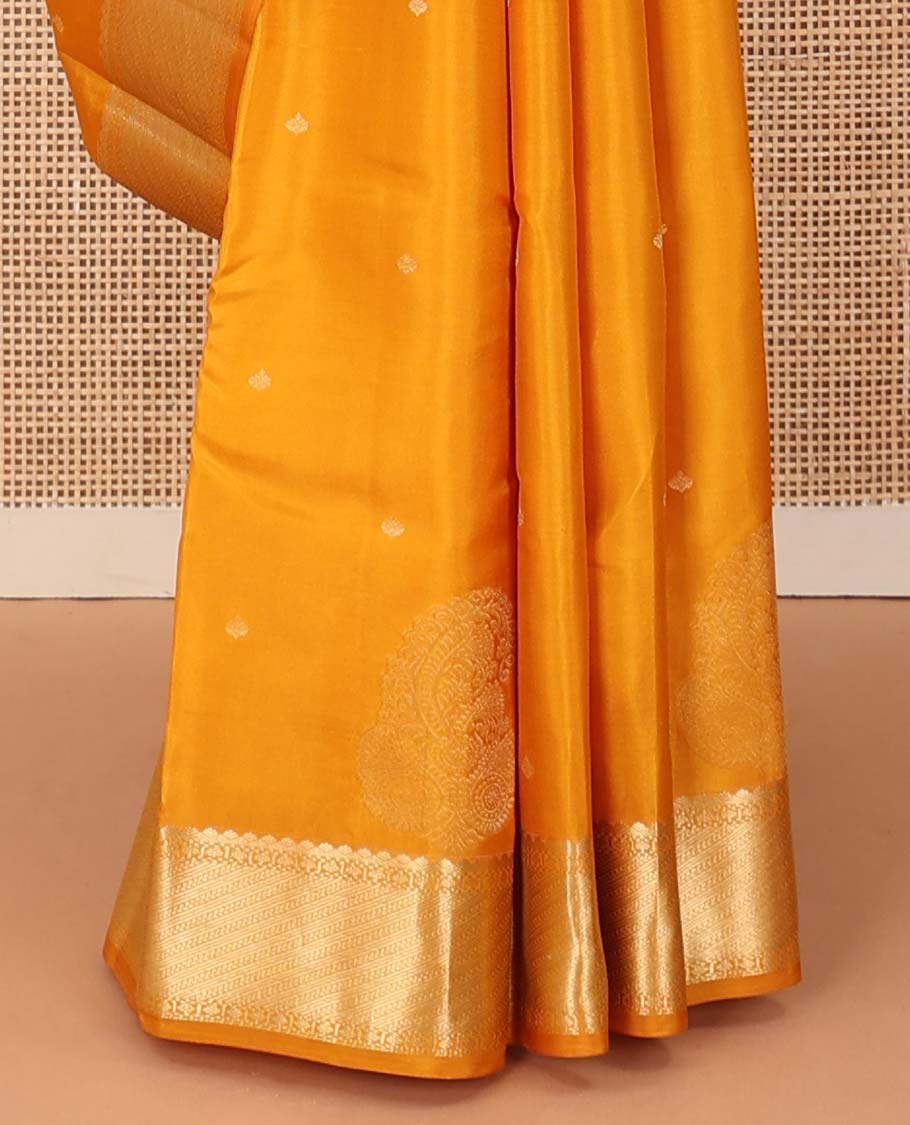 Yellow zari buttas silk saree, traditional zari border and zari-rich jaal pallu
