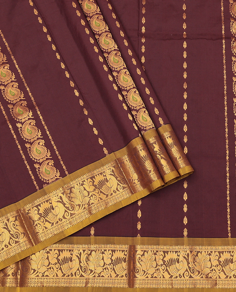 Brown Art Silk Pavadai Material Set, Embellished with Zari Designs on Its Skirt, Complemented by a Contrast Traditional Zari Border, and a Matching Blouse