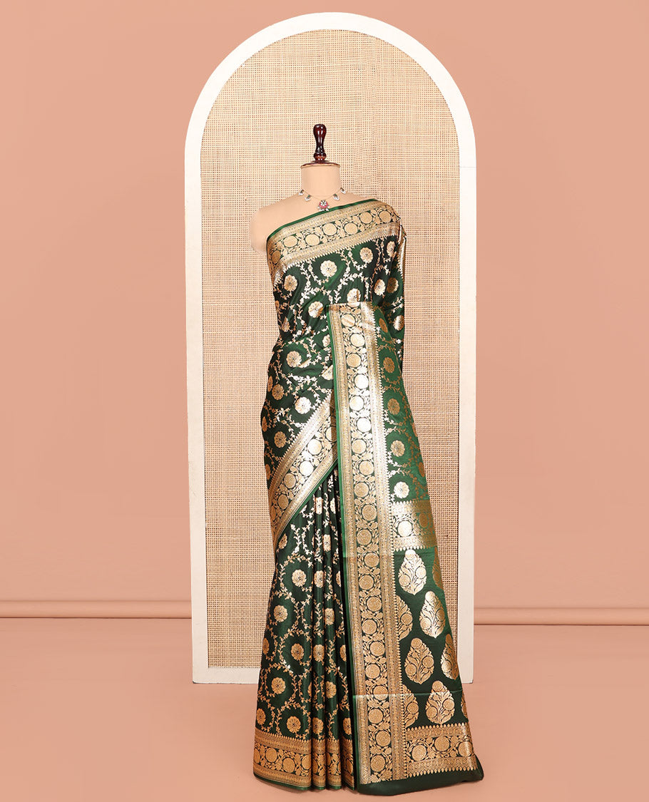 Green Banarasi Nylon Saree, Gleamed Up with Floral Jaal Jacquard, Highlighted by Traditional Zari Border, Intricate Pallu, and a Matching Blouse