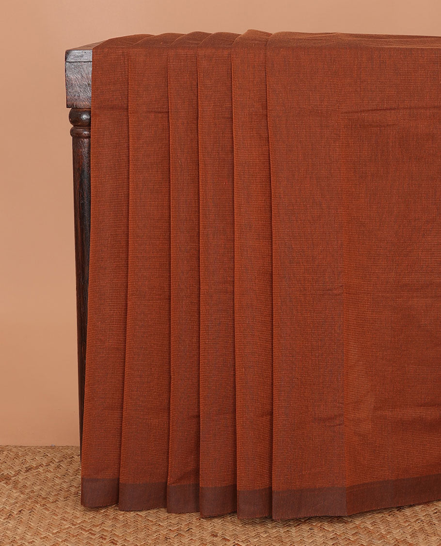 Brown sparesly striped Mangalagiri Cotton saree, plain border, plain pallu, and contrast Pichwai cow printed blouse