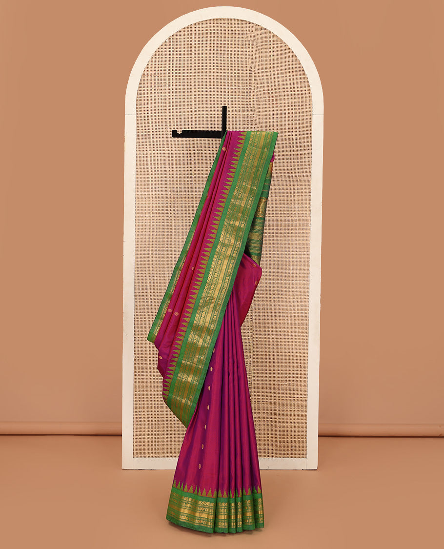 Pink chakram buttas gadwal silk saree, contrast thazampoo rekku border of manga mokku, star kamalam, and vanki designs