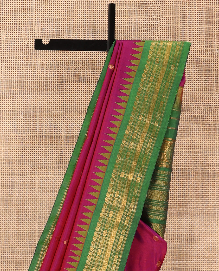 Pink chakram buttas gadwal silk saree, contrast thazampoo rekku border of manga mokku, star kamalam, and vanki designs