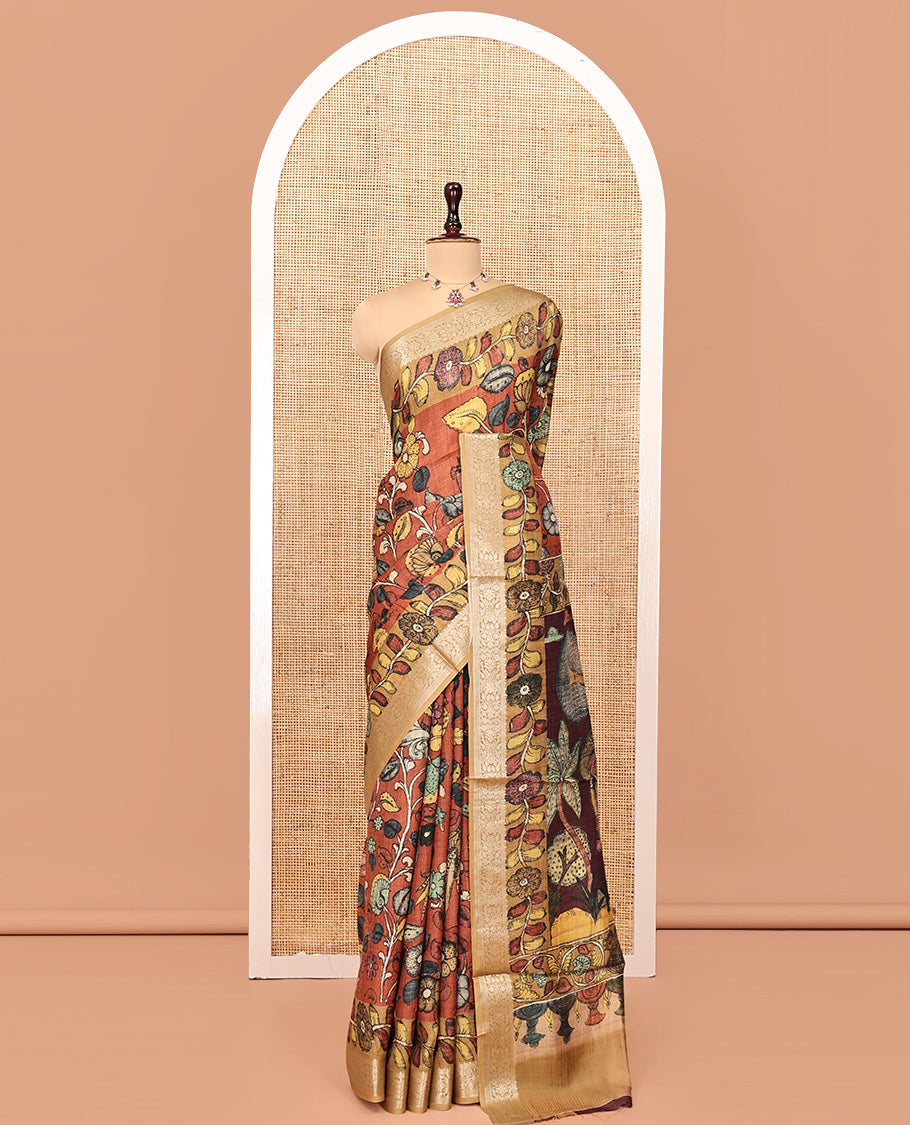 Brown Kalamkari Saree, Elevated with Floral Print, Complemented by Contrast Zari Border, Pallu of Lord Krishna Motifs, and a Contrast Blouse