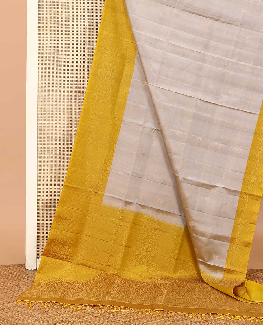 Grey buttas soft silk saree, contrast floral jaal border, and pallu of floral jaal designs